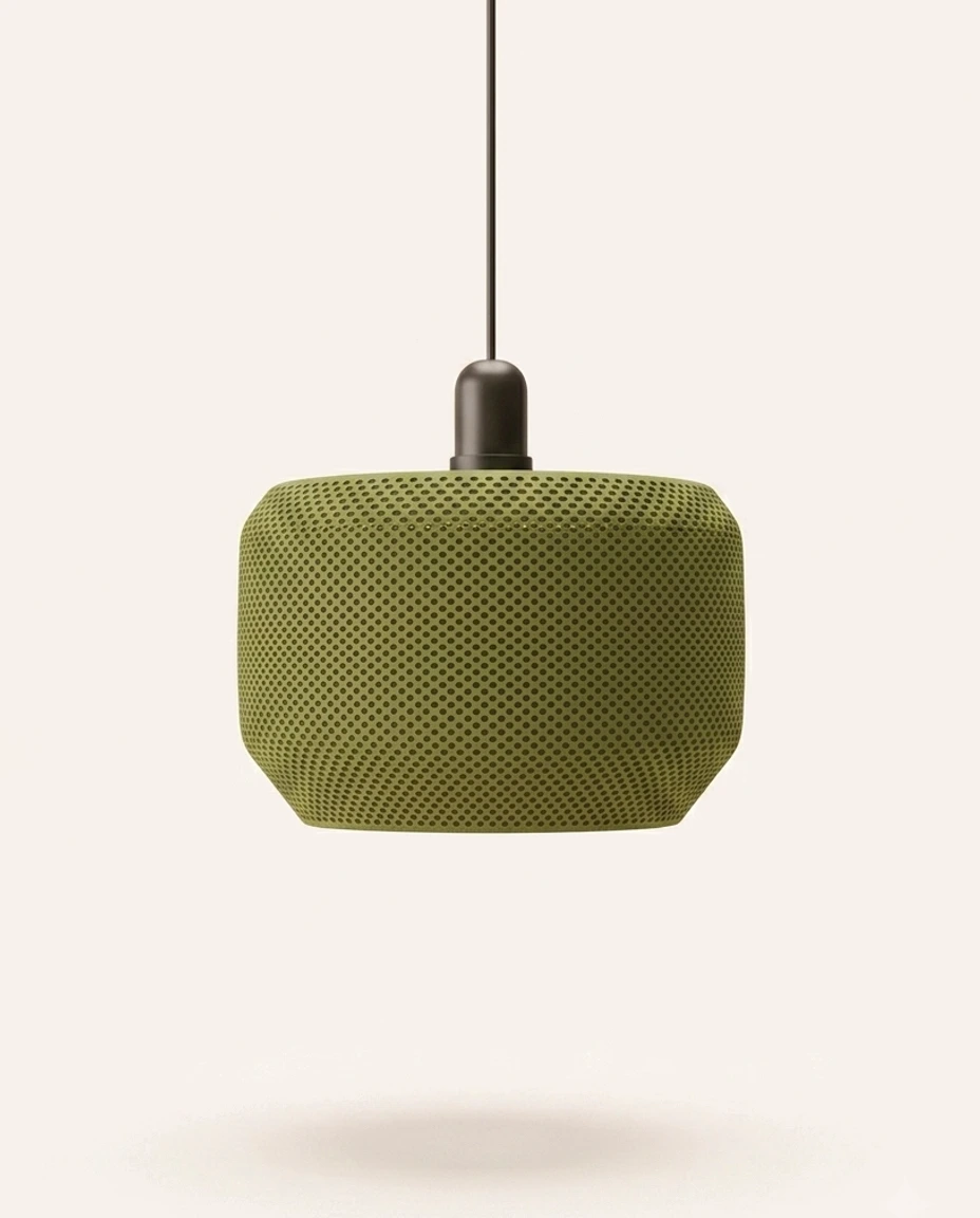 Pendente Jade — Cúpula de tambor perfurada em verde-jade, suspensa por cabo preto.